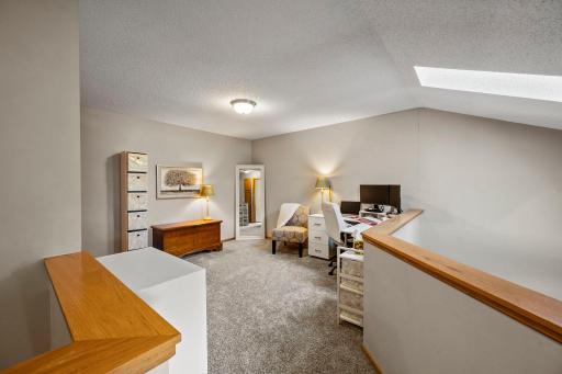 Upper level loft is great office space, workout room or future bedroom!