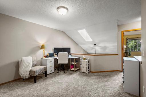 Bright and sunny with skylight and open to below