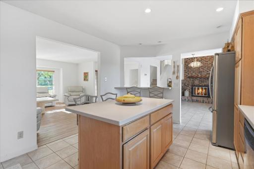 A spacious center island provides additional prep space and casual seating in the kitchen!