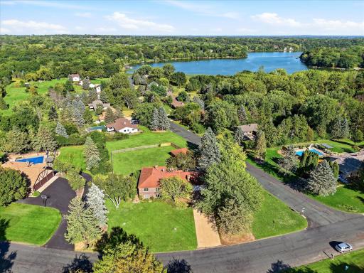 Garage loverâs paradise with an incredible 6.5 total garage stalls on 1 acre in the sought-after Tri-Lakes area!