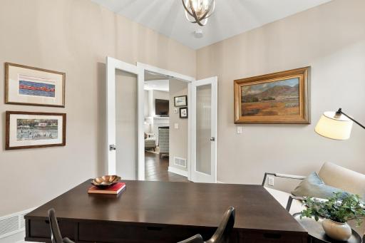 Main floor office with privacy doors