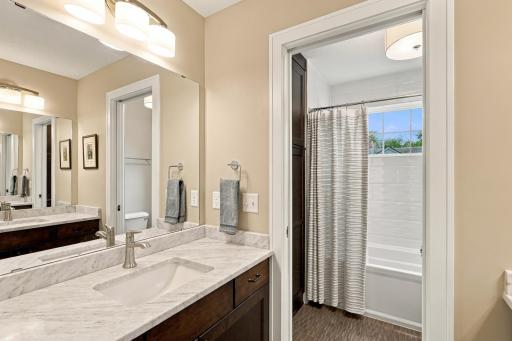 Double sinks in hallway bath