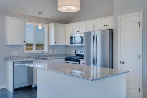 Photo shows the same floor plan but not the actual home. Variations will occur. Photos of actual home will be uploaded when home has been completed and cleaned.