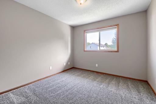 2 of 3 upper level bedrooms