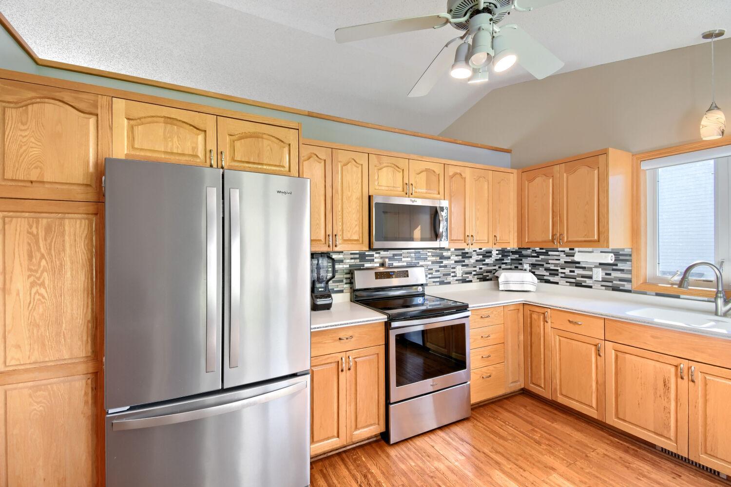 Hardwood floors and Corian countertops