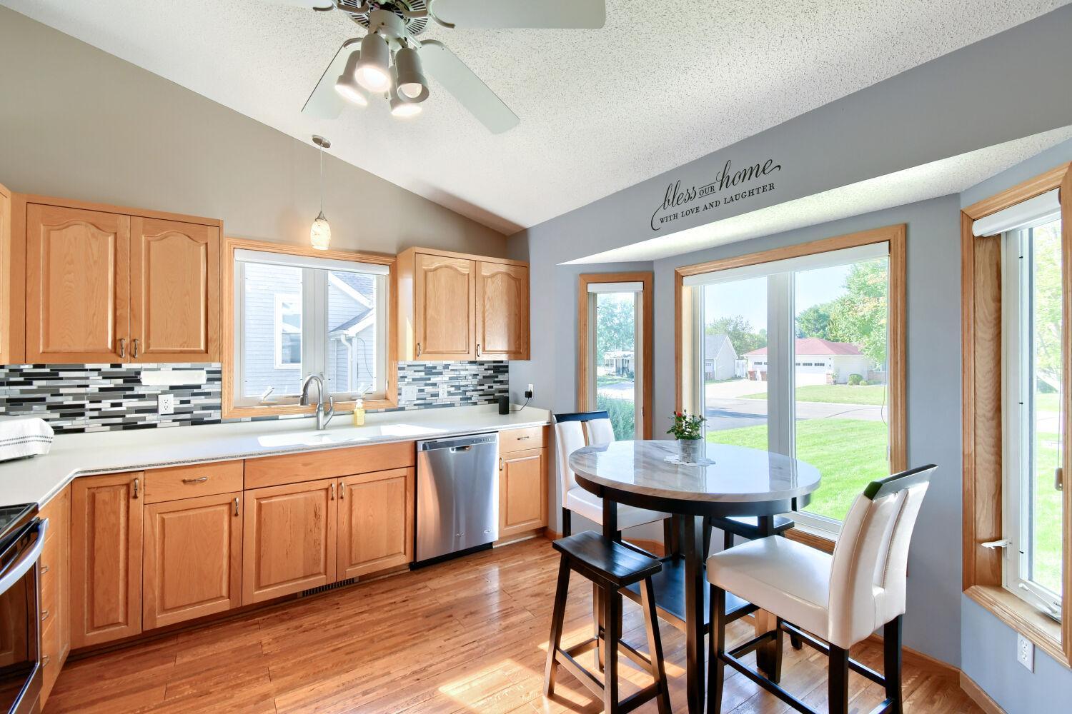 Eat in kitchen with vaulted ceilings and Lots of light.