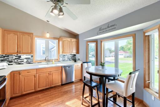 Eat in kitchen with vaulted ceilings and Lots of light.
