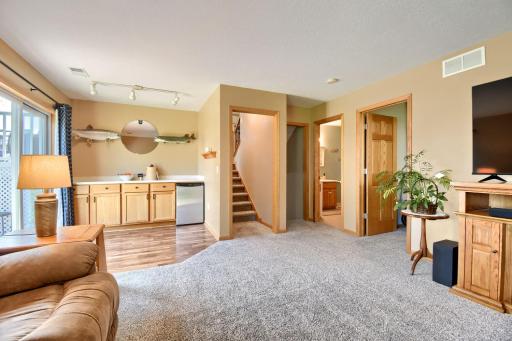 Dry bar with fridge in family room