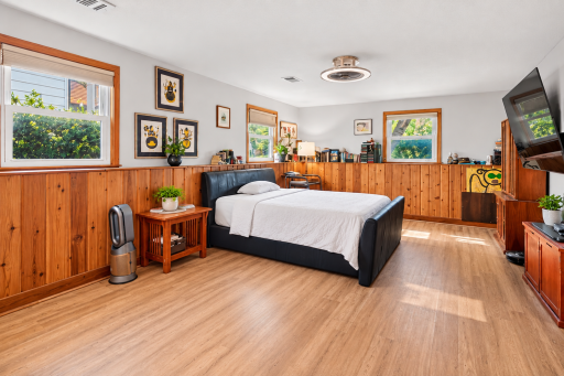 Lower level bedroom or family room- virtually staged