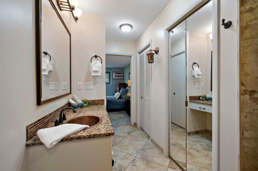 Large primary bathroom with large closets