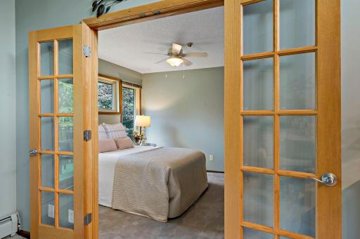 French doors allow light to spill in the room