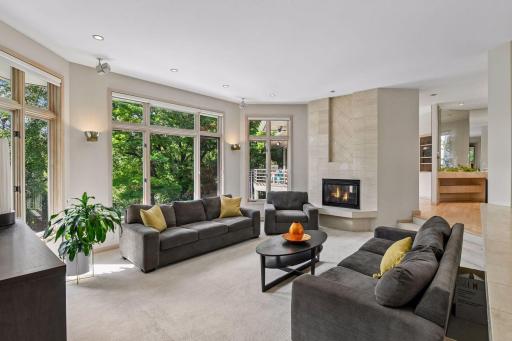 Light-filled living room with expansive windows.