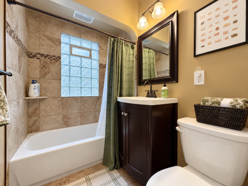 A soak after a long day or a quick start to the morning. The tiled tub surround, vanity storage and glass-block window pair everyday function with natural light and privacy.