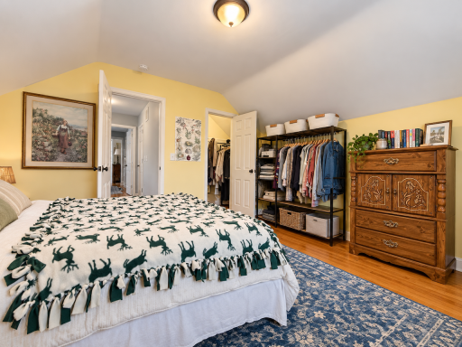 Spacious and quiet bedroom for your furnishings and wardrobe without giving up room to live. This reverse view shows closet storage, space for a large dresser and a clear path to the upstairs bath..