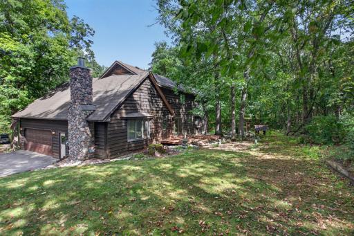 Large 2 story with primary bed and laundry on main level. 2.5 acres and 5 car garage