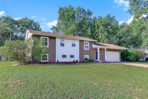 Welcome to 2348 106th Avenue NWâa spacious five-bedroom, two-bathroom home featuring an attached two-car garage, updated windows, and a desirable cul-de-sac location.