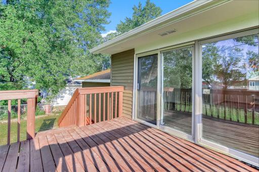 Raised backyard deck with plenty of room for outdoor seating, grilling, and enjoying Minnesotaâs warmer months.