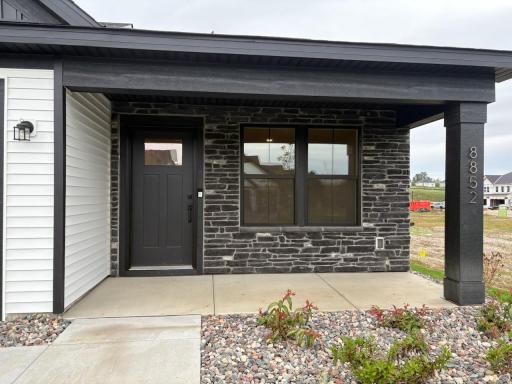 Rock Landscaping and Border Around Home