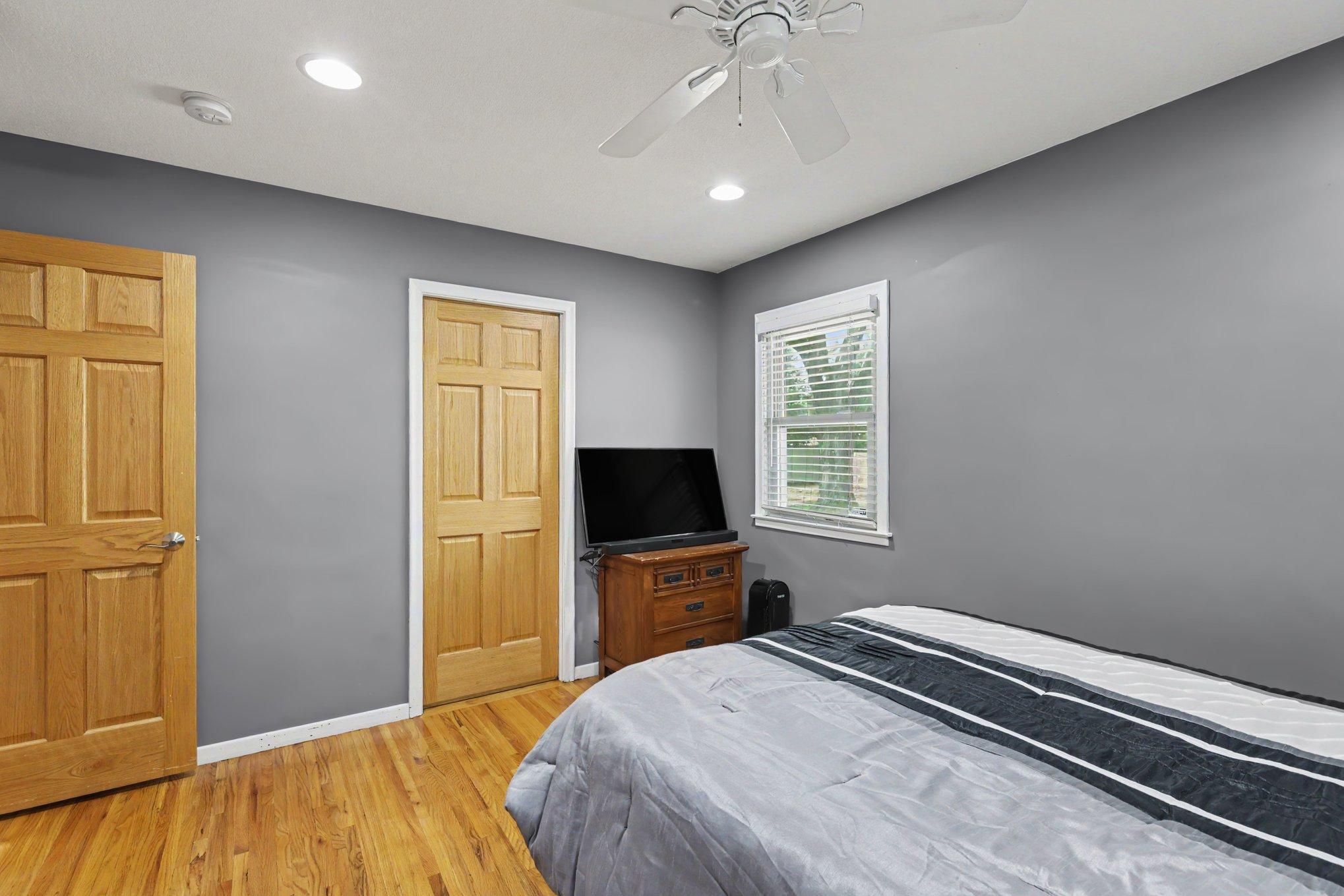 The primary bedroom includes a walk-in closet with a pocket door.
