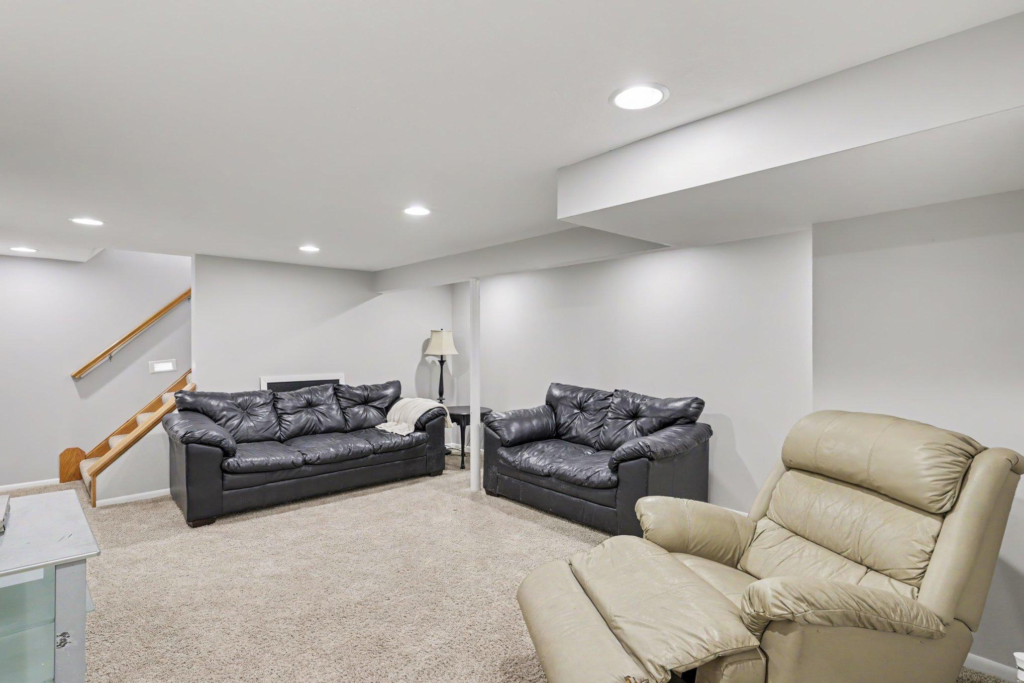 The finished lower level includes a spacious family room.
