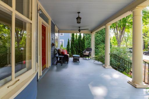 Enjoy the neighborhood on the open front porch.