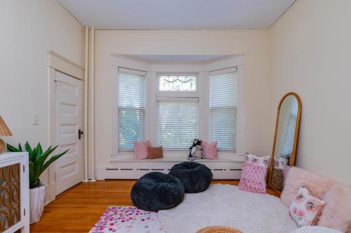 The large main floor bedroom is the perfect place to tuck away toys or to work from home!