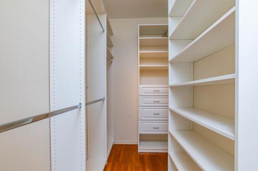 Custom closets in the primary suite walk-in closet.