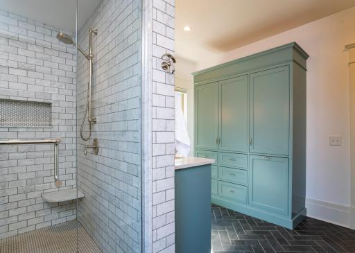 Even more storage in the primary bathroom with custom cabinetry!