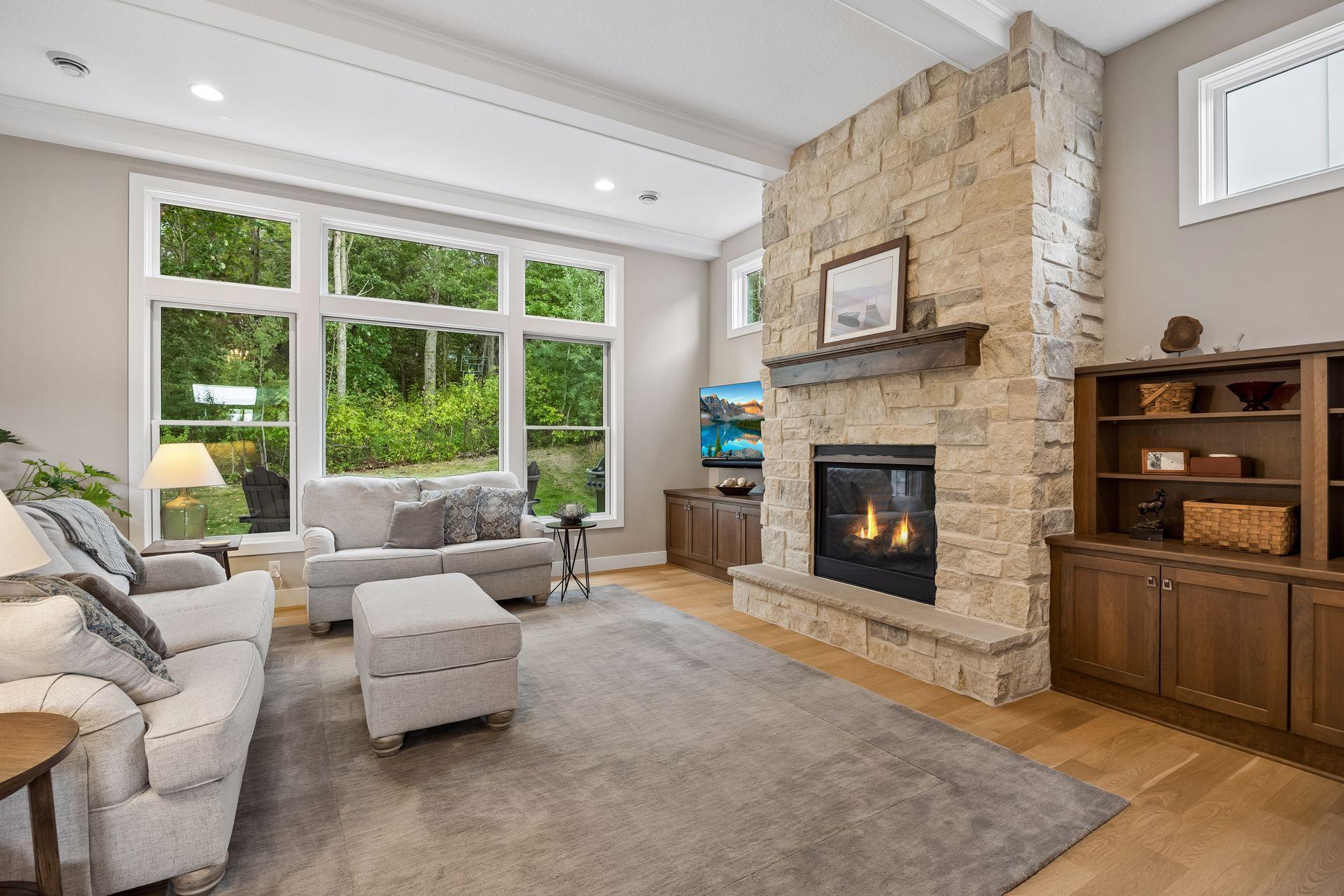 Such a fun space to relax! Beautiful finish selections pair perfectly with all the greenery and natural light coming through the windows.