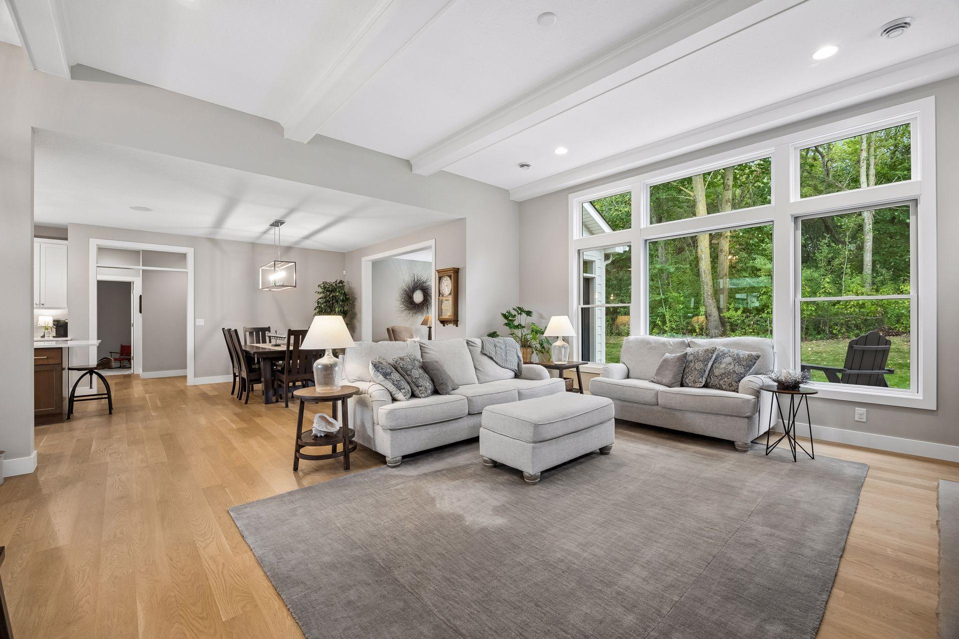 From the great room, the home opens beautifully into the dining area and kitchen—an ideal layout for everyday living and entertaining.