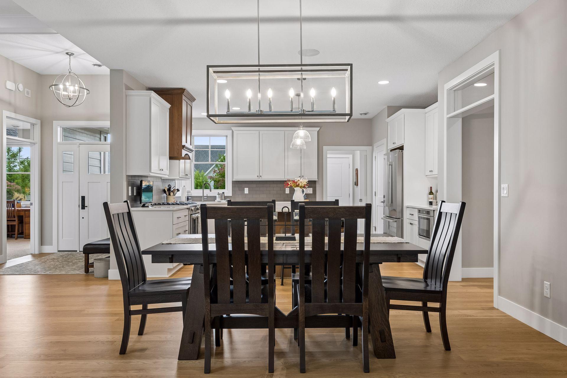 Plenty of room to host! The spacious dining area flows seamlessly into the kitchen and surrounding living spaces.