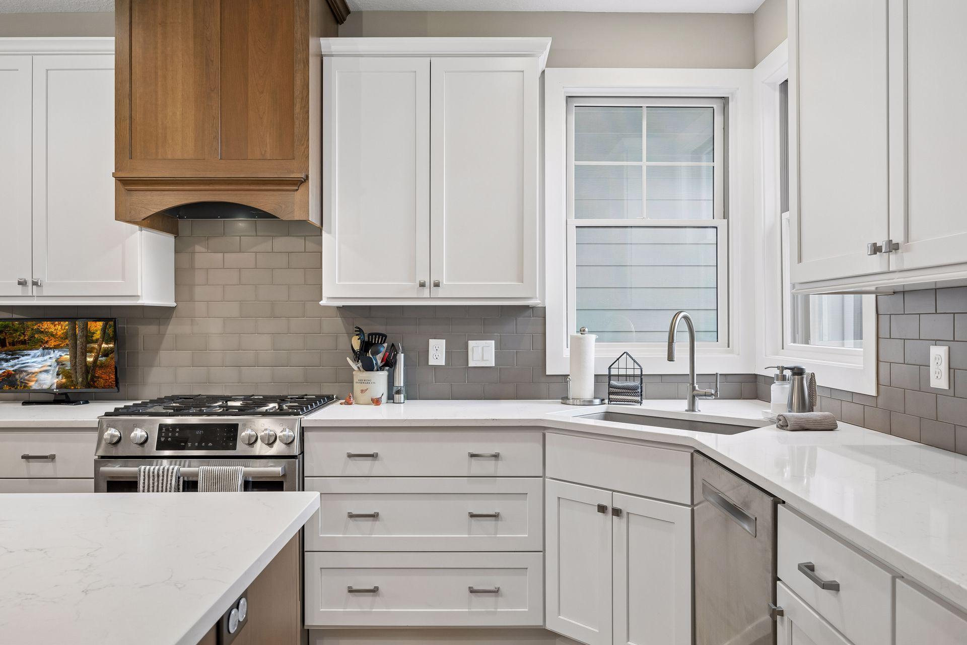Even the kitchen enjoys wonderful natural light, with a perfectly placed window adding to the bright and airy feel.