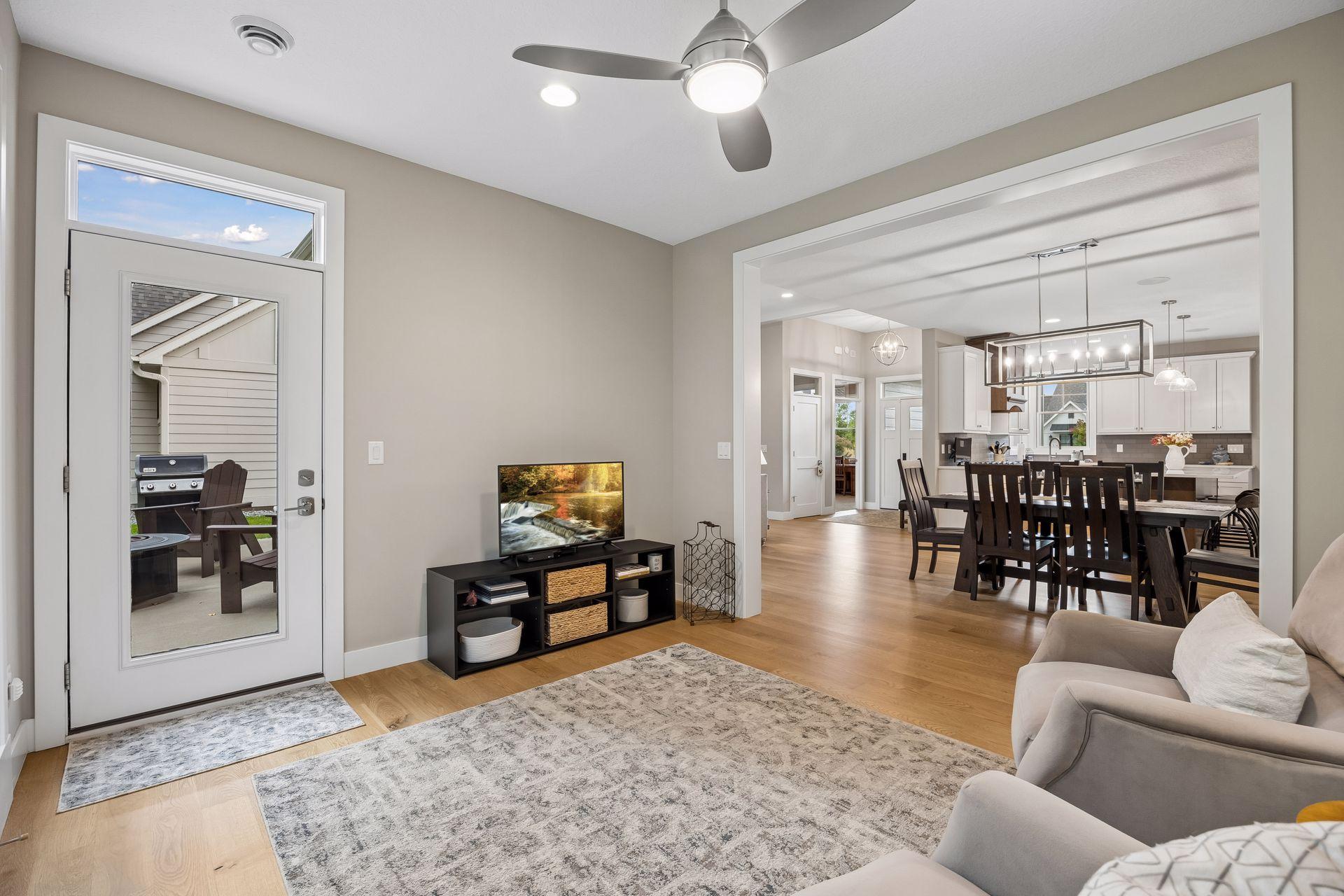Step directly from the sunroom onto the backyard patio, creating an easy connection between indoor and outdoor living.