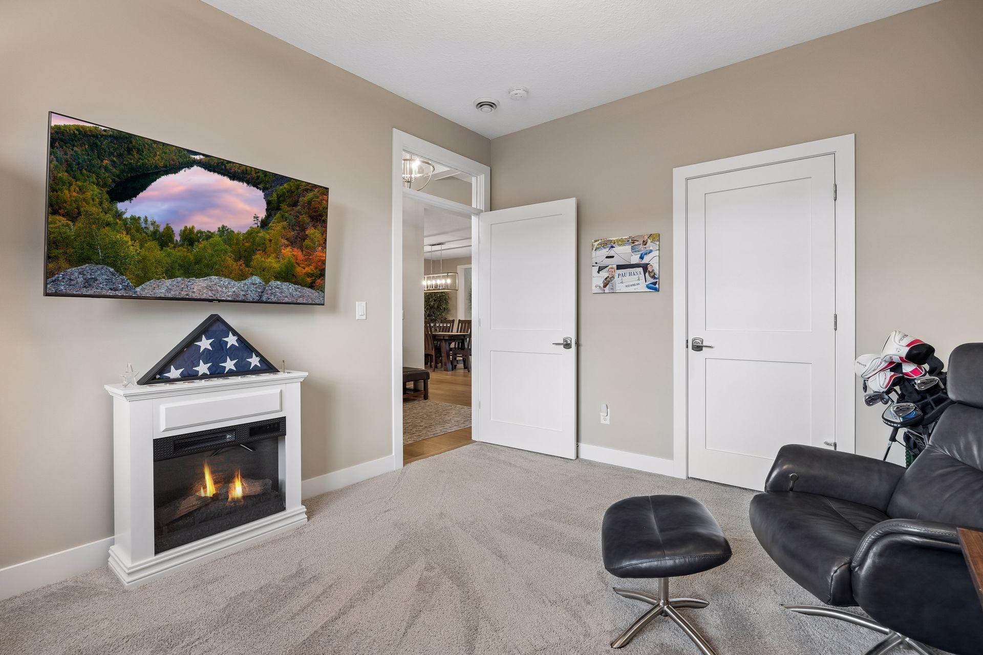 Another look at the front bedroom, currently set up as an office and sitting room, with an abundance of natural light.