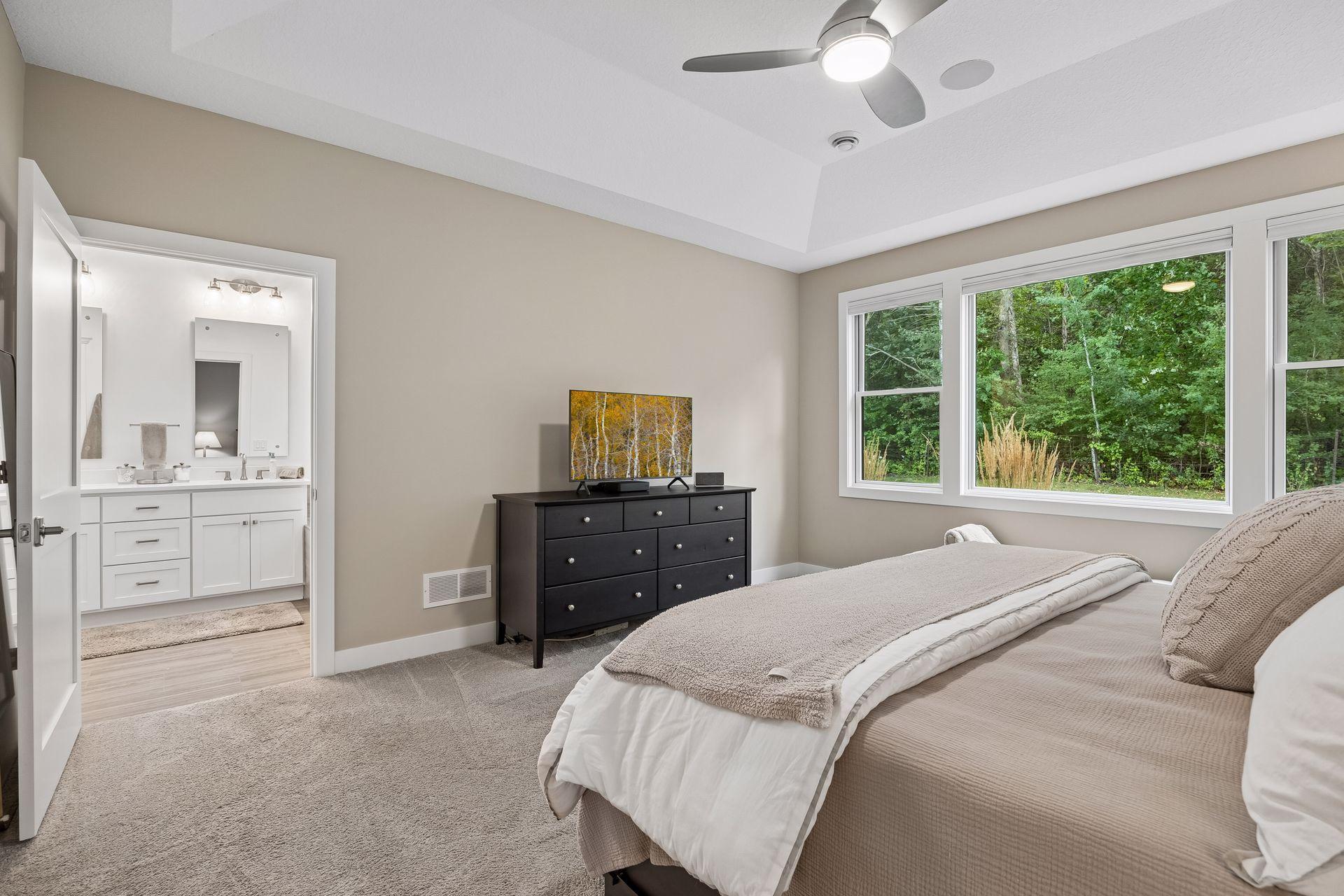 The primary bedroom flows directly into a spacious private ensuite, creating a true owner's retreat.