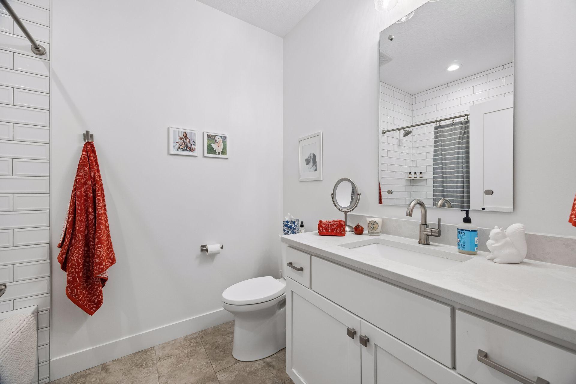 A second full bathroom on the main level conveniently serves the additional bedrooms and guests.