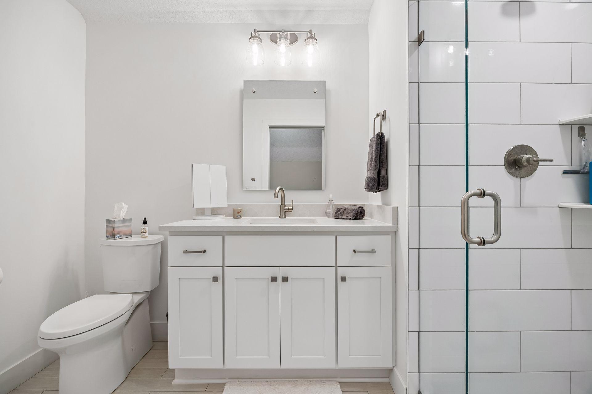 A private 3/4 bathroom with shower completes the bonus area above the garage—such a great setup for guests!