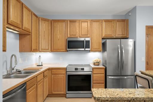 Welcome home to this fully updated end unit which offers bright open living spaces. New high end appliances, granite island top and under cabinet lighting are just the tip of the iceberg in this immaculate home.