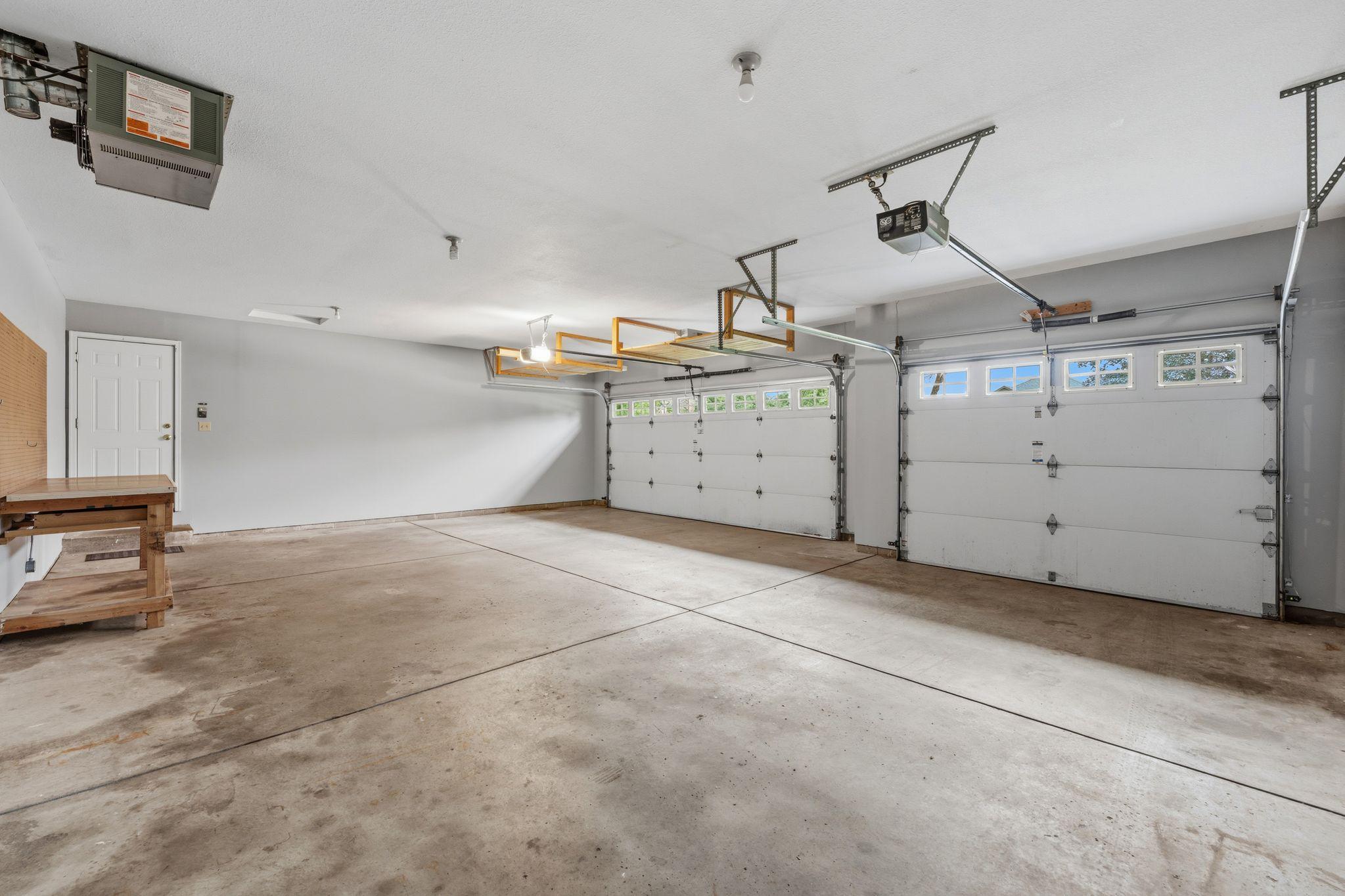 THREE-car HEATED and INSULATED garage!!!!