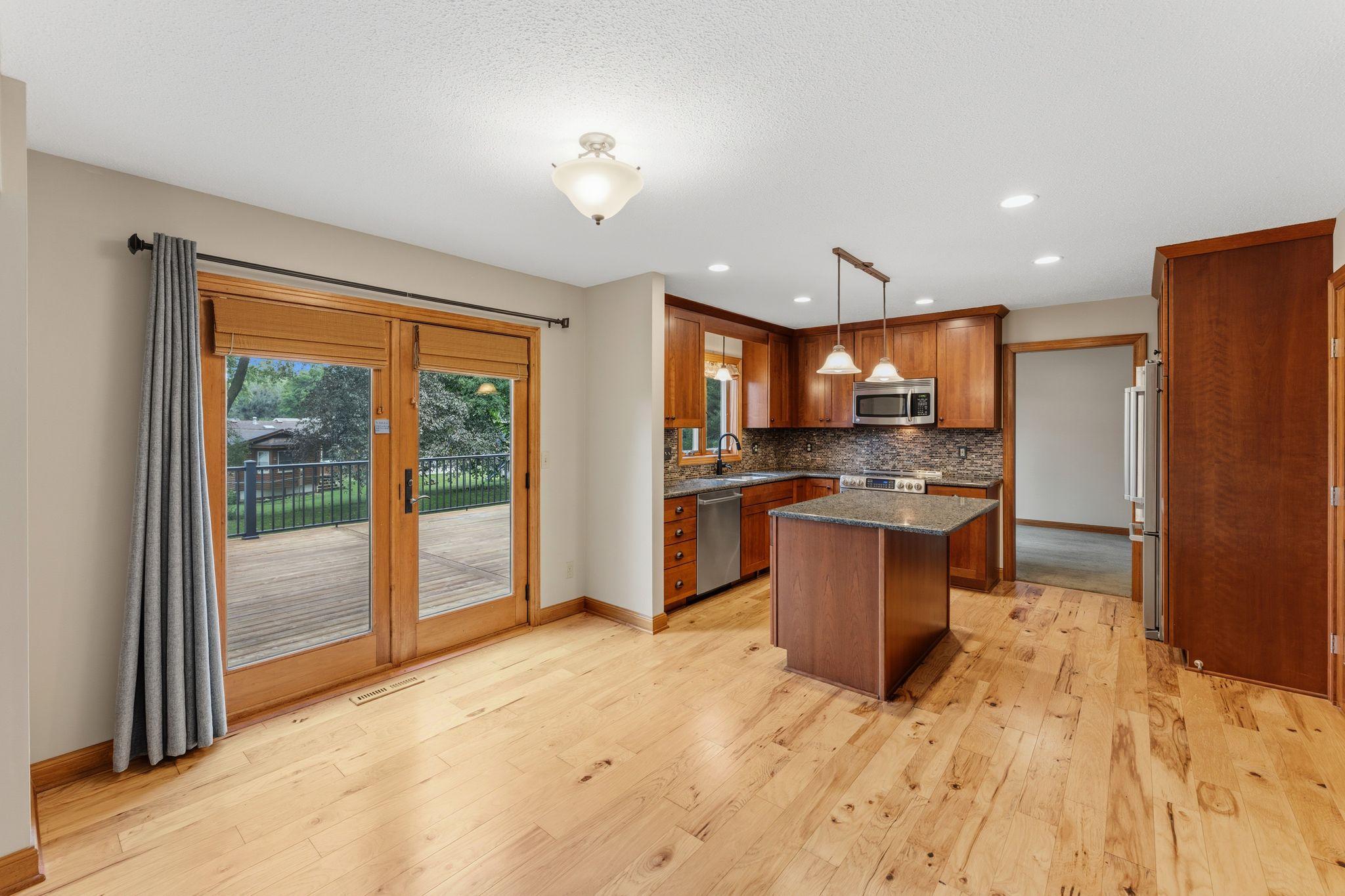 Informal dining space -- walk out your patio door to an expansive deck!