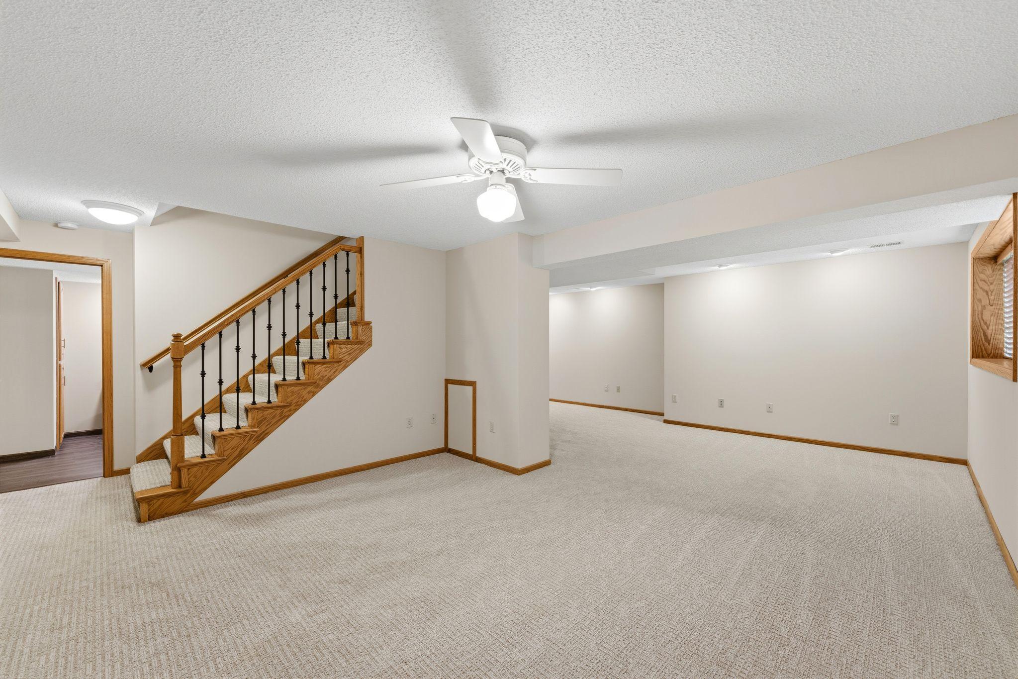 Head downstairs to a wonderful, finished family room/recreation room!!