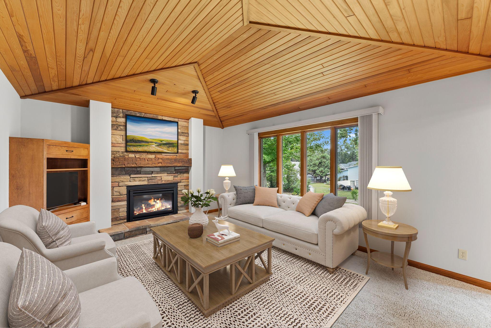 Main floor family room sits adjacent to the informal dining and kitchen! Enjoy the gas fireplace and cozy up for movie night! *Virtually Staged*