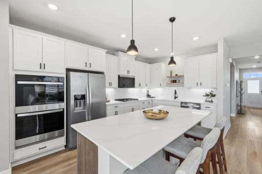 Spacious kitchen with lots of counter, cabinet space and walk in pantry!