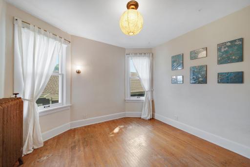 Abundant windows in large bedroom with bay.jpg