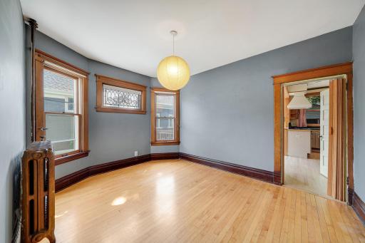 Dining area with bay and original decorative window.jpg