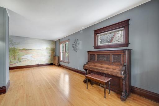 Living room with piano space to fill with your favorite music.jpg
