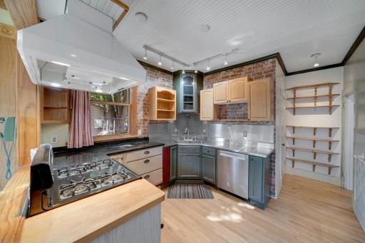 Well planned kitchen maximizing convenience, storage & use.jpg