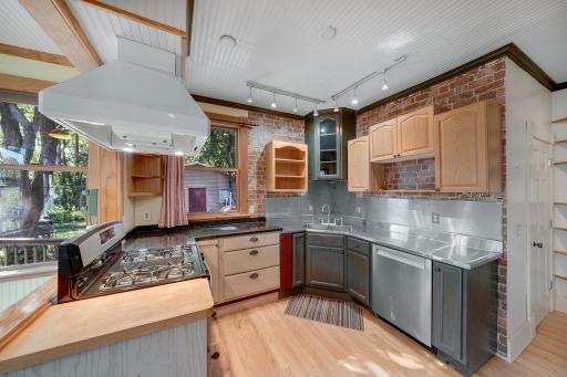 Very functional kitchen with durable surfaces and fixtures.jpg