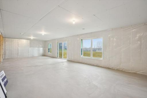 The unfinished walkout basement is a perfect place to make your own how you want.