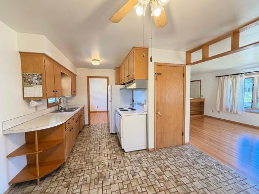 Kitchen leads into flex room